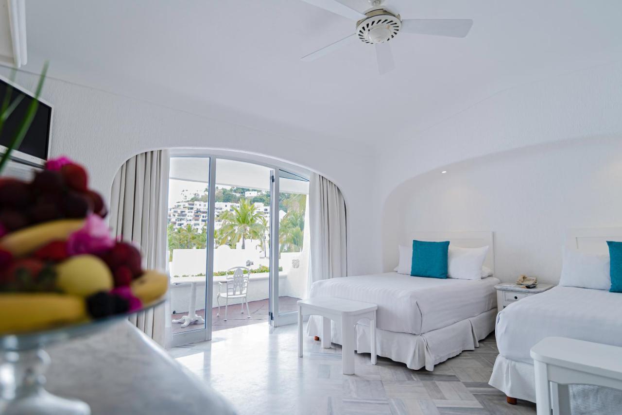 Las Hadas By Brisas Мансанильо Экстерьер фото A room at the hotel