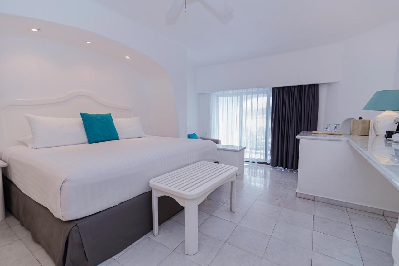 Las Hadas By Brisas Мансанильо Экстерьер фото A room at the hotel